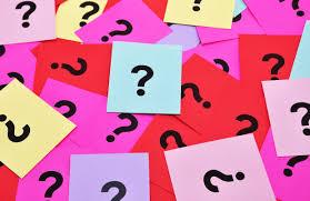 question marks on slips of colorful paper