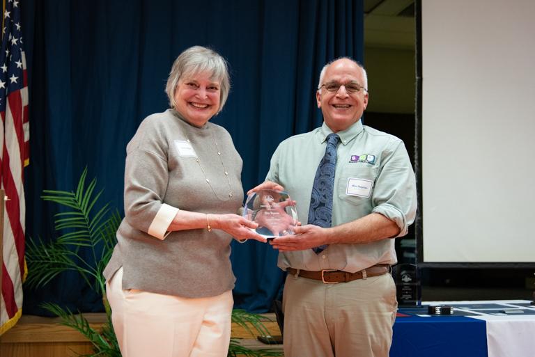 BCPL Ginny delivers the Dreisbach award to Mike Najarian