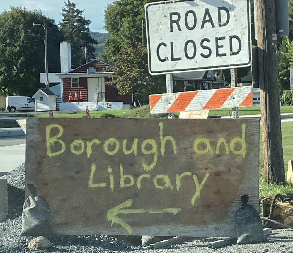 arrow pointing to borough and library entrance