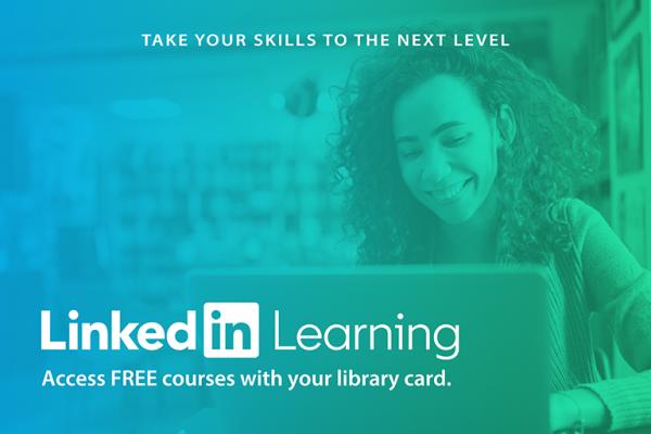 image of lady at laptop smiling while using LinkedIn Learning