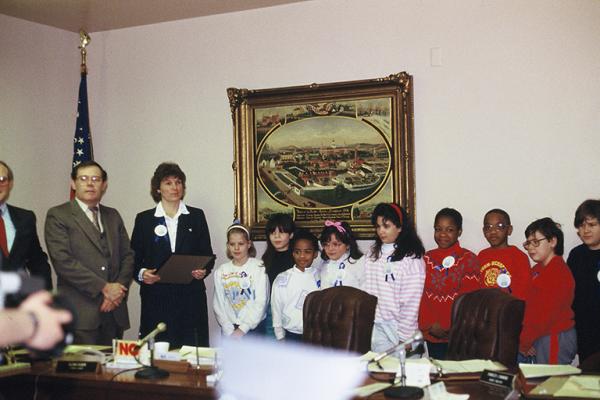 young readers stand together in board room as proclamation was delivered