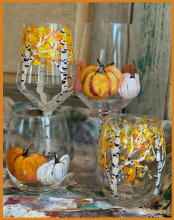 pumkins and birch trees painted on wineglasses with and without stems