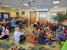 Children play with toys at Wiggly Wednesday.